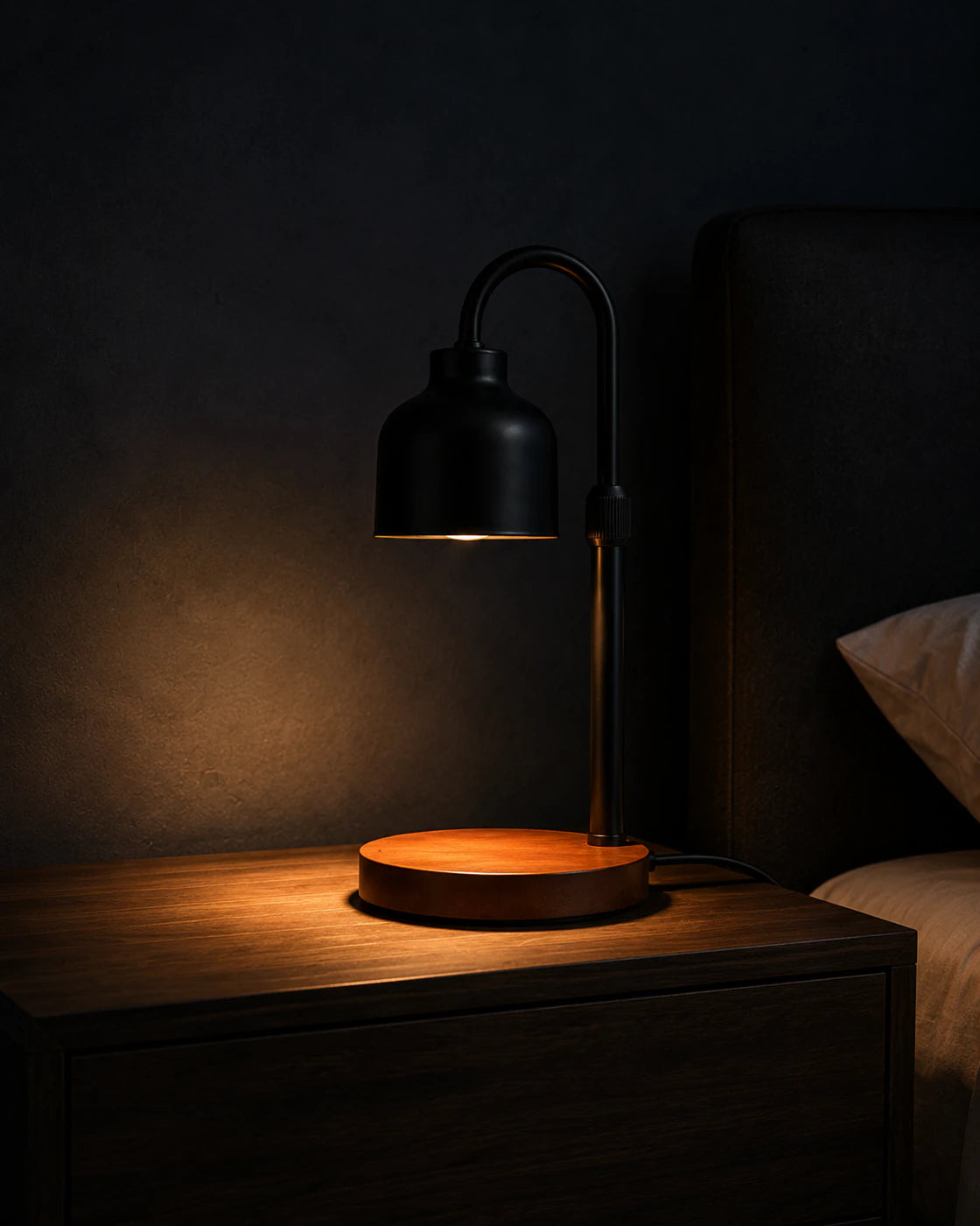 Black Nordic candle warmer lamp photographed from an alternate angle